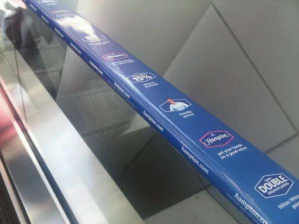 O'Hare escalators. Brought to you by Hampton Inn. Geez.