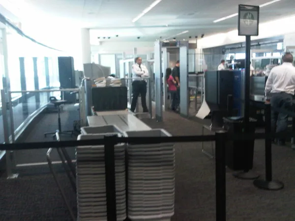 Who closes a security line on the busiest weekend of the year??